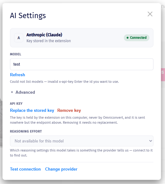 The AI Settings dialog once a provider is connected: model field, links to replace or remove the stored key, and options to test the connection or change provider.